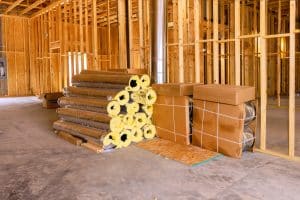 Commercial office renovation in progress with framing and staged materials