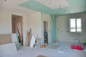 Interior of a new room addition being finished before the yard is landscaped