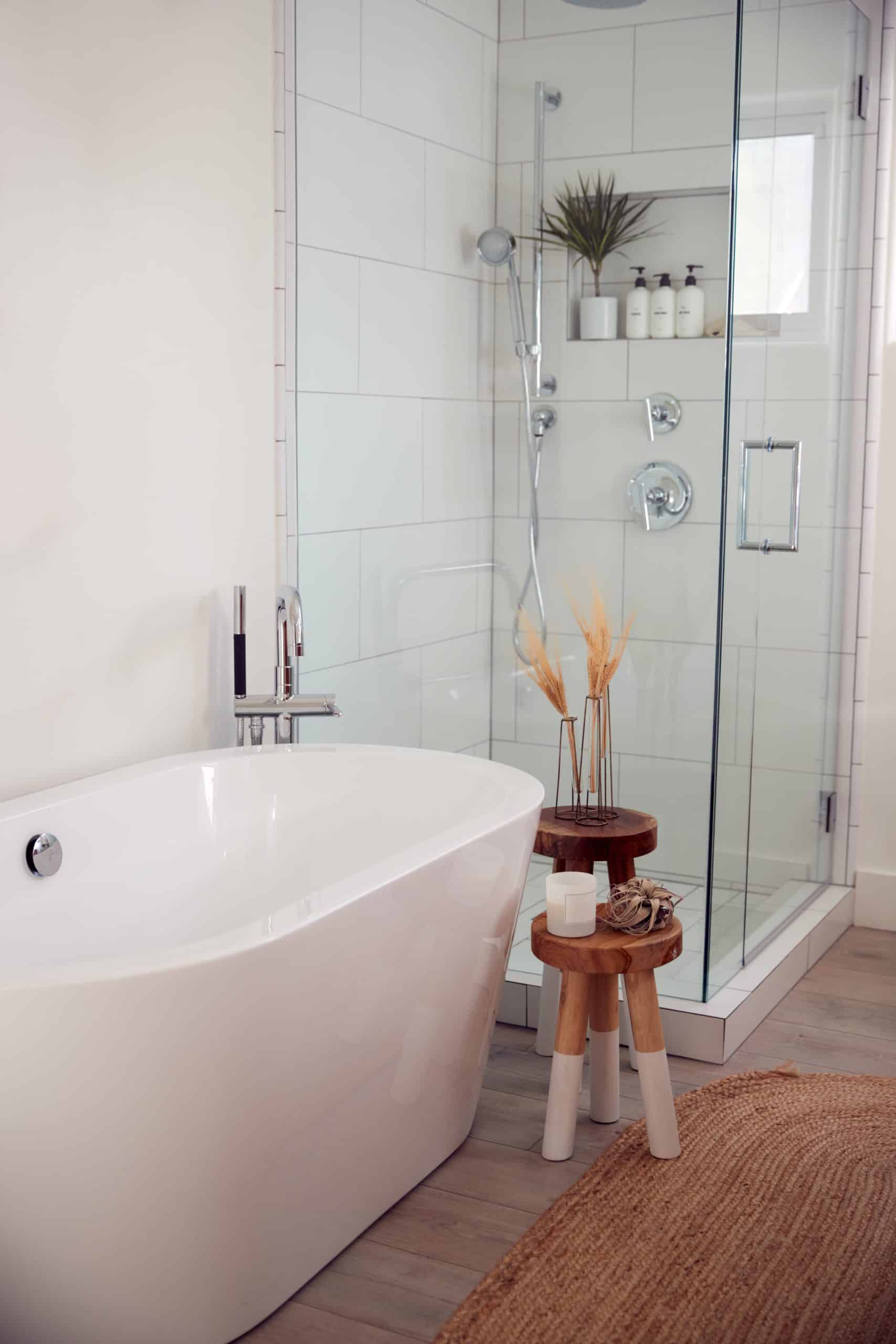 bathroom with tub and shower